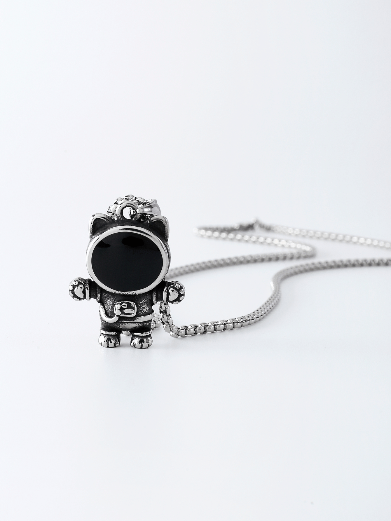 Collier en acier titane astronaute pour homme